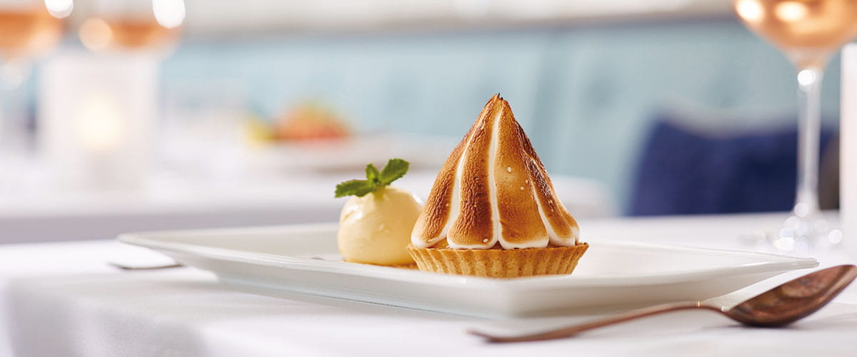 A lemon meringue pie served in the Coast to Coast restaurant on Spirit of Discovery